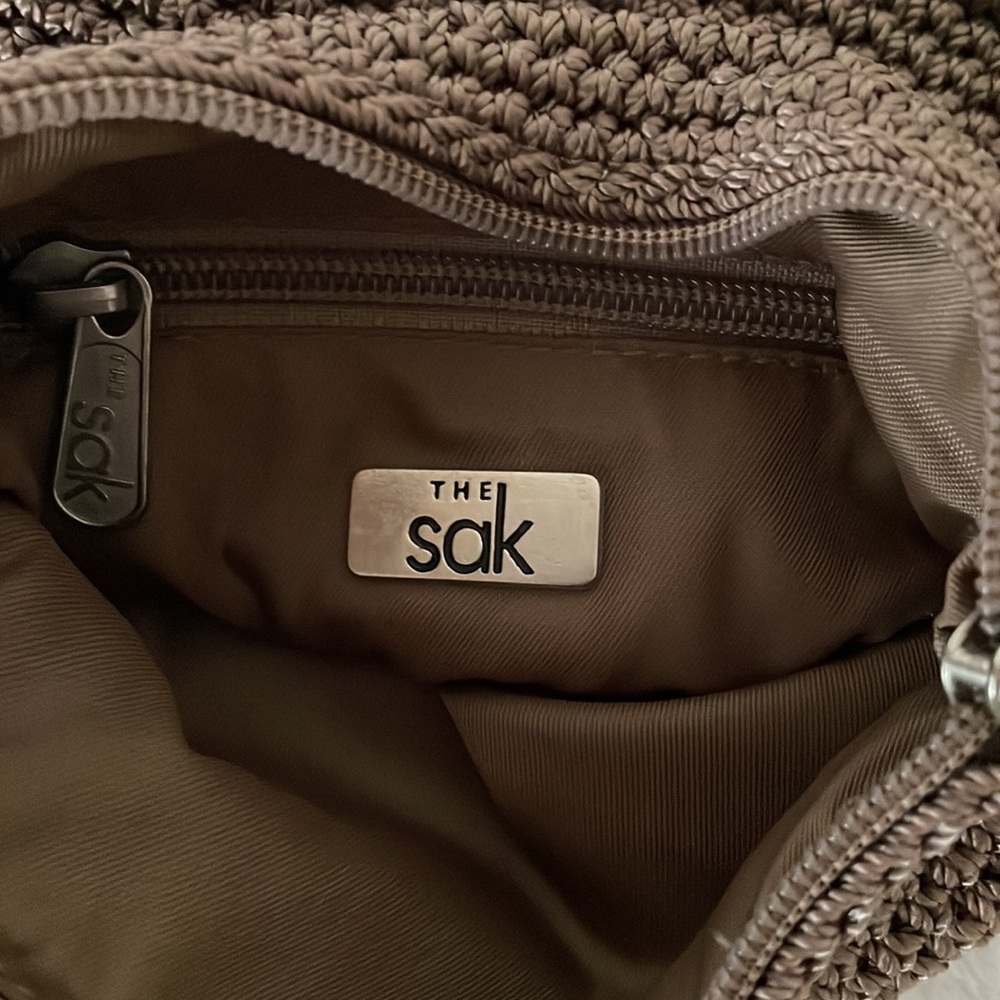 The Sak Shoulder/Crossbody Mini bag. Approximately 19” Strap, 7”x 6.75” x 1.75” - Picture 6 of 6